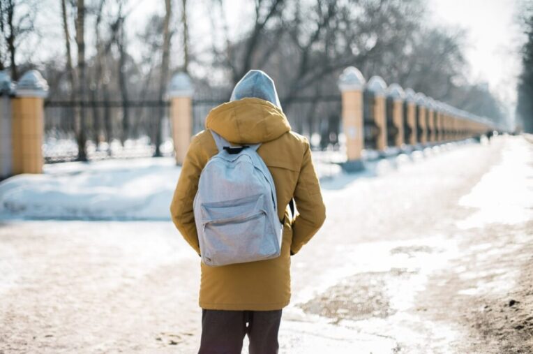 student in winter jacket